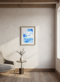 Abstract blue and white watercolor painting in a rustic chic interior.