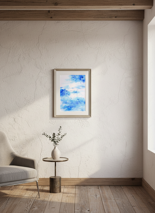 Abstract blue and white watercolor painting in a rustic chic interior.