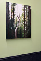 Forest scene painting on a light green wall