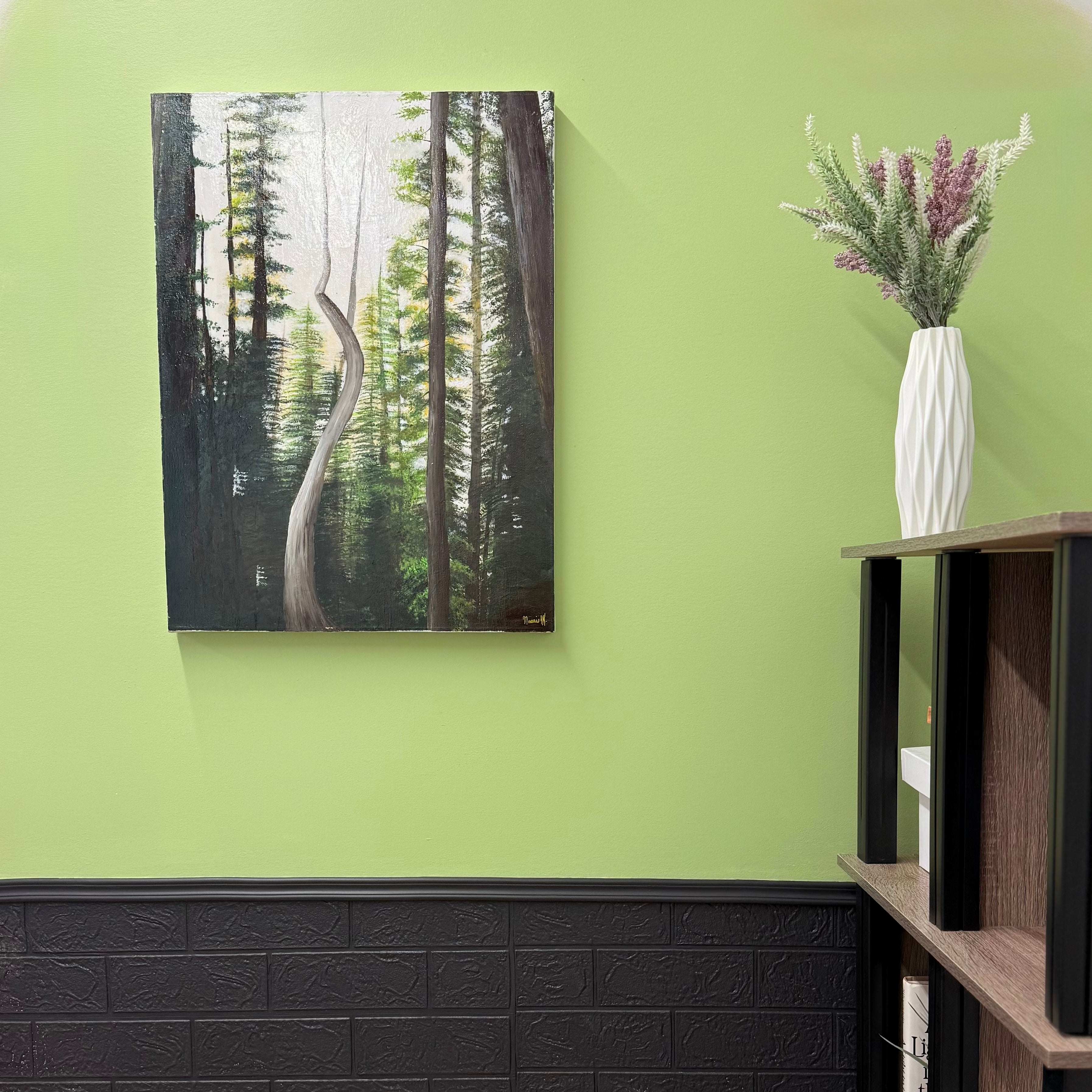 Forest painting on a green wall with a vase of flowers on a shelf.