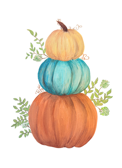 Stack of pumpkins with green leaves on a white background