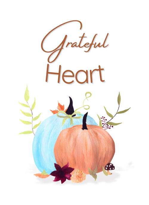 Decorative design with pumpkins and the word 'Grateful Heart' on a white background