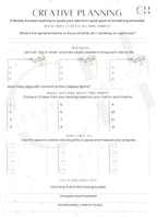 Creative Planning worksheet on a artist boho wooden desk with boho decor